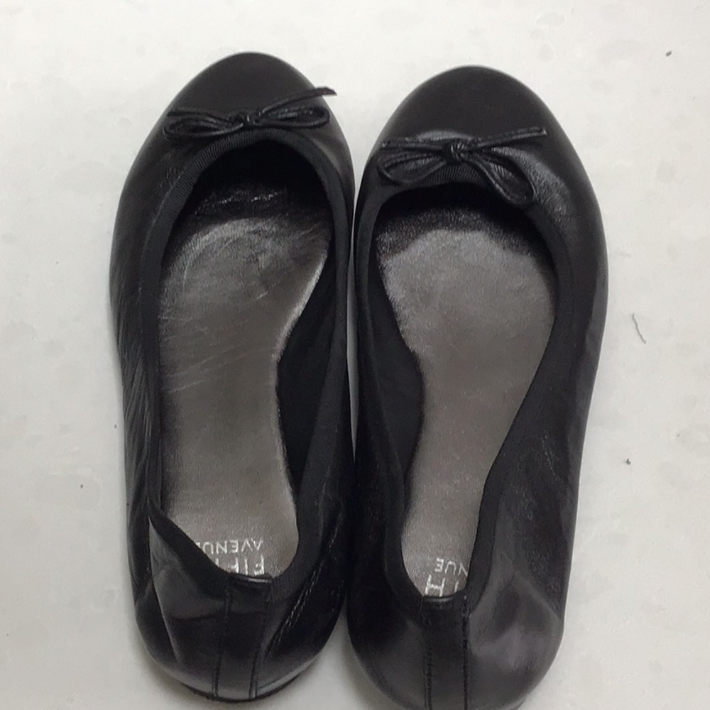 Black leather flats